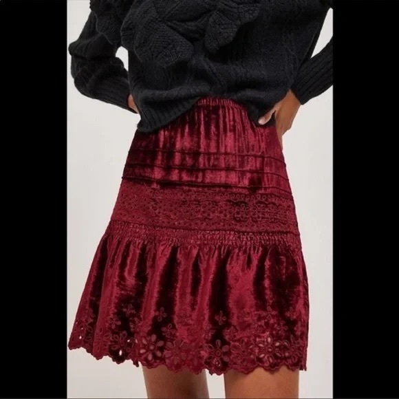 NWT Anthropologie Cherie eyelit velvet miniskirt. Gorgeous garnet like color.
